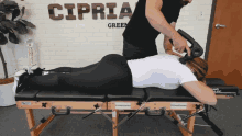 massaging dr joseph cipriano dc relax massage gun ease back pain