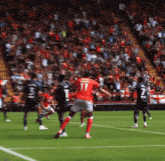 a soccer player with the number 11 on his back