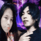 a man and a woman are standing next to each other with a purple background and the word ai on the bottom right