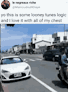 a car and motorcycle are driving down a street .