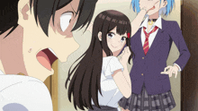 a man and two girls are standing in a room