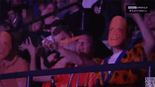 Barney Rubbles Cheering GIF - Barney Rubbles Cheering Masked Guy GIFs