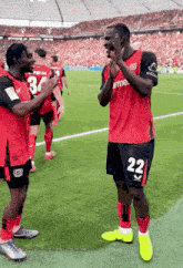 a soccer player with the number 22 on their shorts