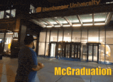 a man stands in front of hamburger university