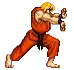 a pixel art of a karate man in red pants .