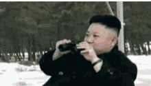 Shaun Mecca Kim Jong Un GIF - Shaun Mecca Kim Jong Un Peeping GIFs