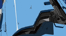 a cartoon drawing of a blue robot with a gun on it 's back .