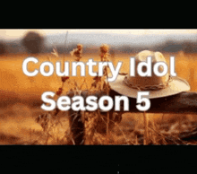 a cowboy hat is sitting on a wooden fence post with the words country idol season 5 written above it