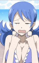 a girl with blue hair and a swimsuit is crying