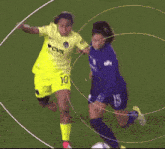 a female soccer player wearing a yellow cvs health jersey is being tackled by another player