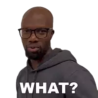 a man wearing glasses and a hoodie is asking what