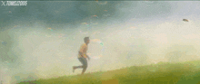 a painting of a man playing with soap bubbles with the year 2005 at the top