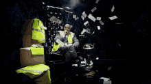 a man smoking a cigar and holding a stack of money