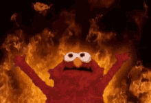 Elmo Burning Background GIF - Elmo Burning Background Hand Raised GIFs