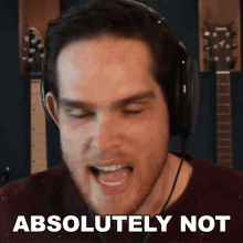 a man wearing headphones says " absolutely not "