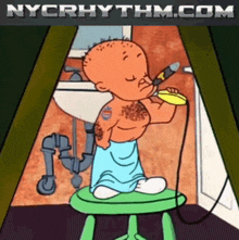 a cartoon of a baby sitting on a green stool with nycrhythm.com written on the bottom