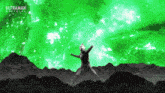 a man is standing in front of a green background that says ultraman official on it
