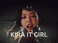 a woman is smiling with the words kira it girl written below her