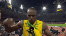 Jamaican GIF - Usain Bolt Heart GIFs