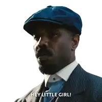 a man wearing a suit and hat says hey little girl