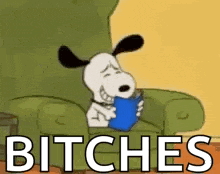 snoopy is sitting in a chair reading a book and saying bitches