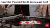 a person is playing a record on a turntable with the words now who tf picked this lil joshua ass beat