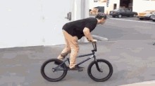 H GIF - Bike Tricks Spin GIFs