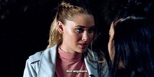 two women are talking to each other and one of them says not anymore