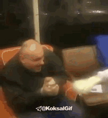 a gif of a man being punched by another man with the hashtag @koksalgif