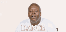 a bald man with his eyes closed and the word dance written above him