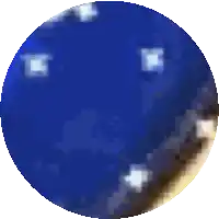 a pixelated image of a blue circle with white stars on it