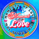a colorful circle that says moments of love