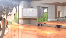 a girl is standing in a room with a whiteboard that says ' a ' on it