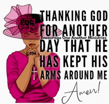 a woman wearing a pink shirt and a pink hat is praying with a cross around her neck .