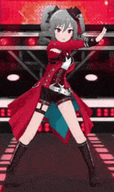a anime girl in a red coat is dancing on a stage .