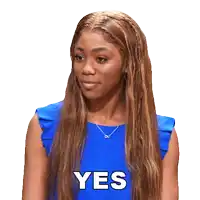 a woman in a blue shirt says yes on a white background