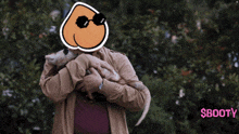 a man and a woman standing next to each other with a booty sticker on their heads