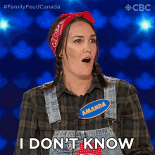 a woman with overalls and a name tag that says amanda