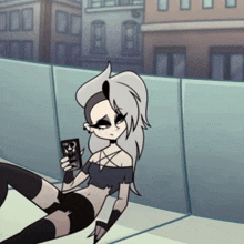 a cartoon character with a pentagram on her shoulder