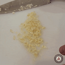 Scooping Up The Garlic Smoked Reb Bbq GIF - Scooping Up The Garlic Smoked Reb Bbq Getting The Chopped Garlic GIFs