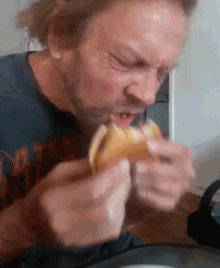 Guy Eating GIF - Guy Eating Burger GIFs