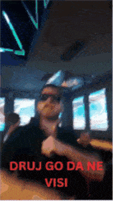 a blurry picture of a man with sunglasses and the words drug go dane visi on the bottom