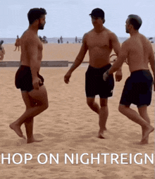 a group of men walking on a sandy beach with the words hop on nightreign above them
