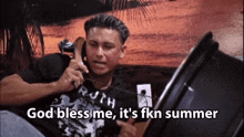 a man in a ruth shirt is talking on a phone and saying god bless me it 's fkn summer