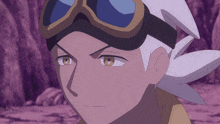 a close up of a cartoon character with goggles on his head