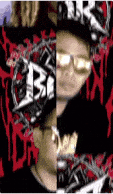 a blurry picture of a person with the letter b on their hat