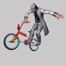 a person in a trench coat is riding a bike