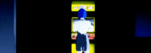 a person is playing a video game in a dark room with a blue background .