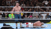 a man in a wrestling ring with a peacock logo in the corner