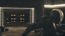a dark room with thunderbolts on the bottom right